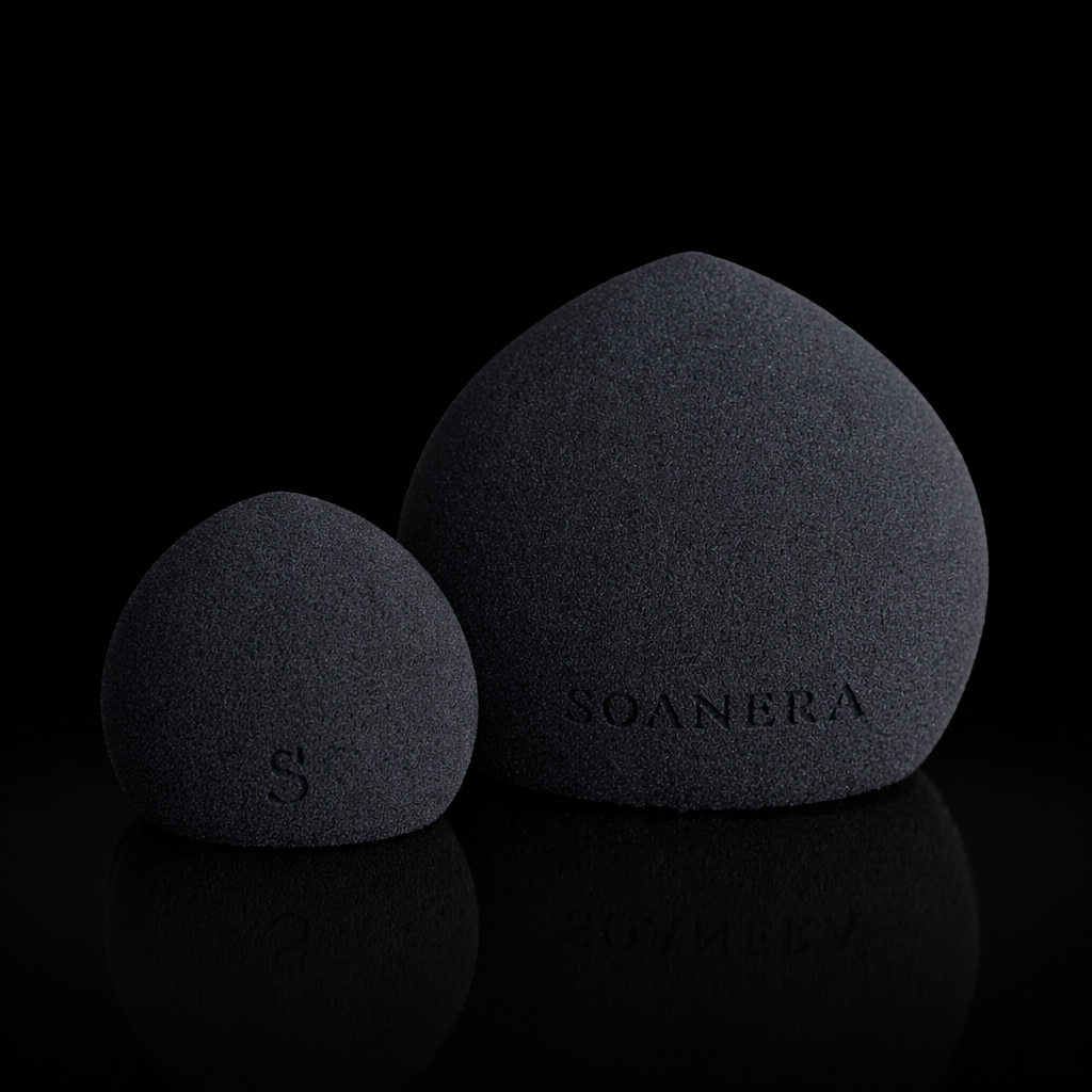 Two black makeup sponges with 'SOANERA' branding on a black background