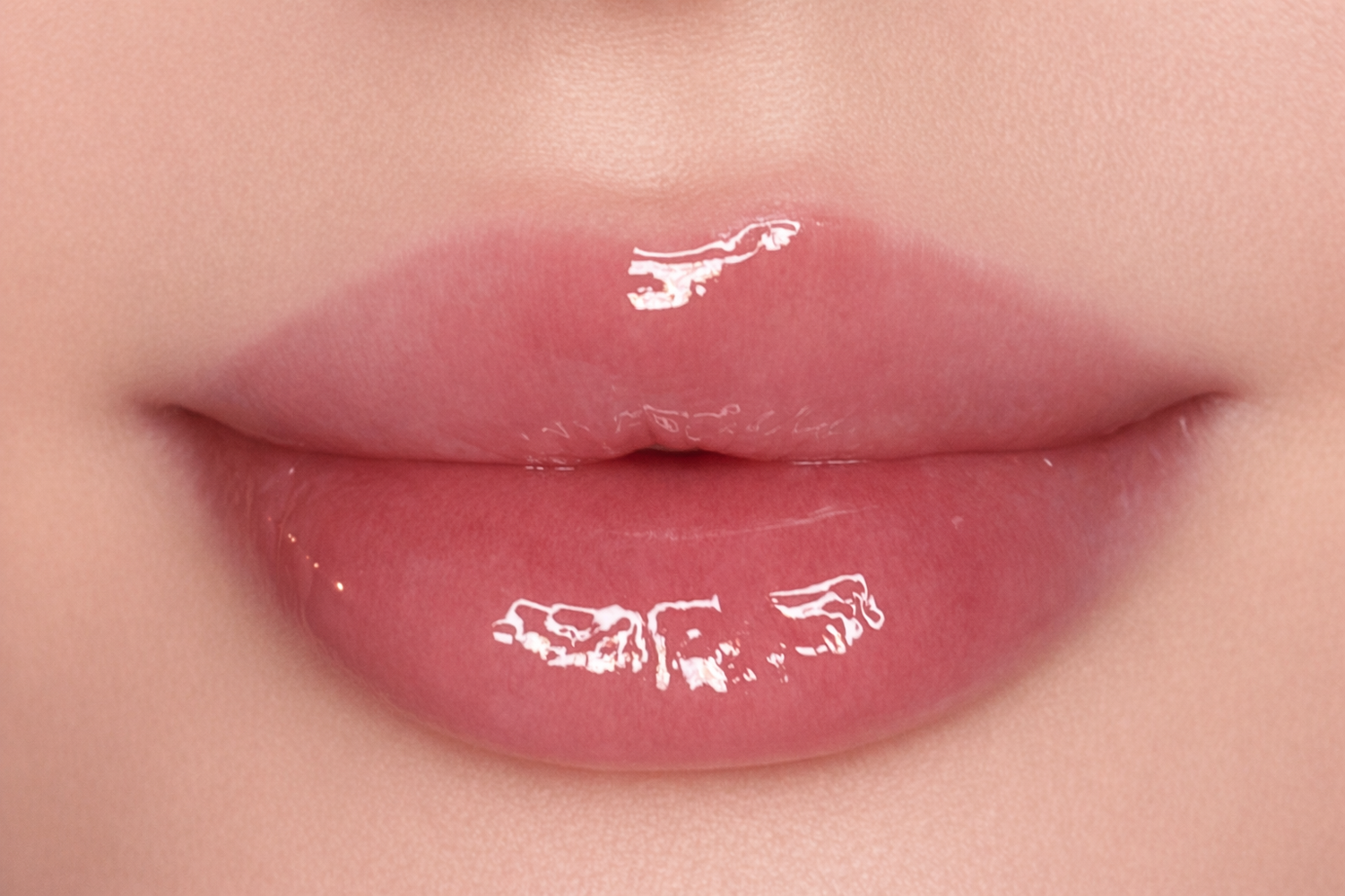 Close-up of lips wearing SOANERA clear lip gloss-oil on lips