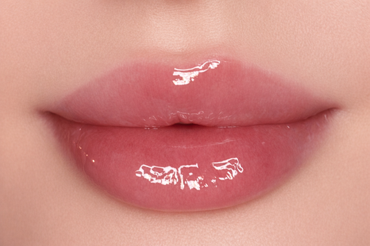 Close-up of lips wearing SOANERA clear lip gloss-oil on lips